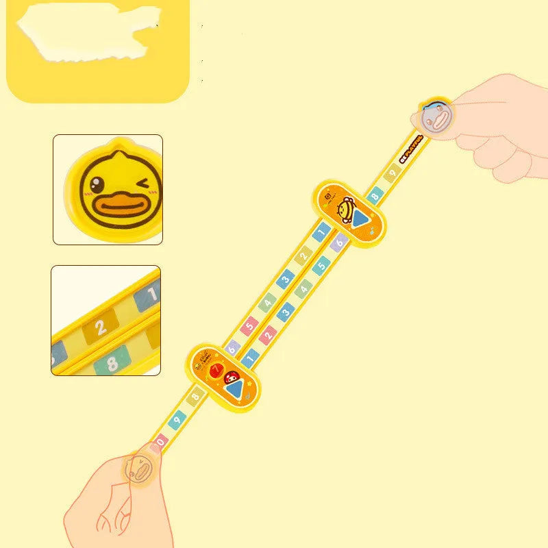 Yellow plastic children's digital resolution ruler with cartoon graphics measuring 24.5 cm long
