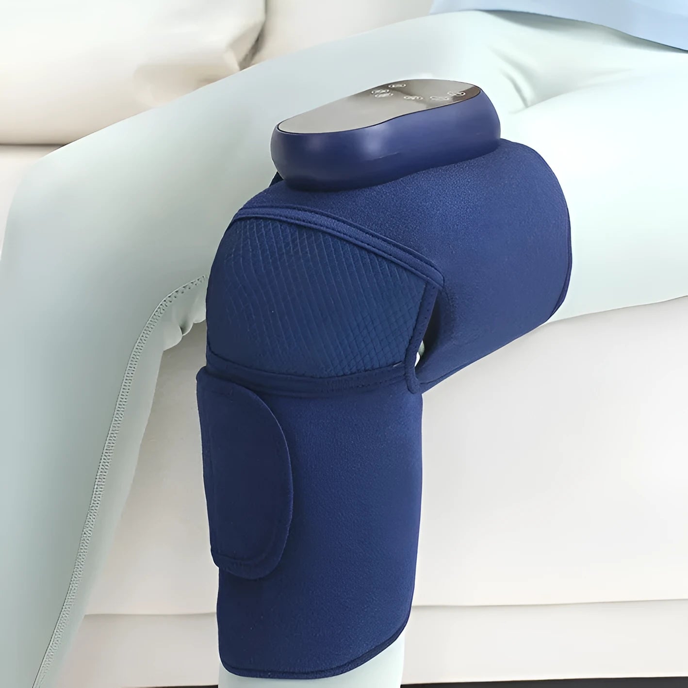 Blue single airbag self-heating knee massager with vibration and compression functions.