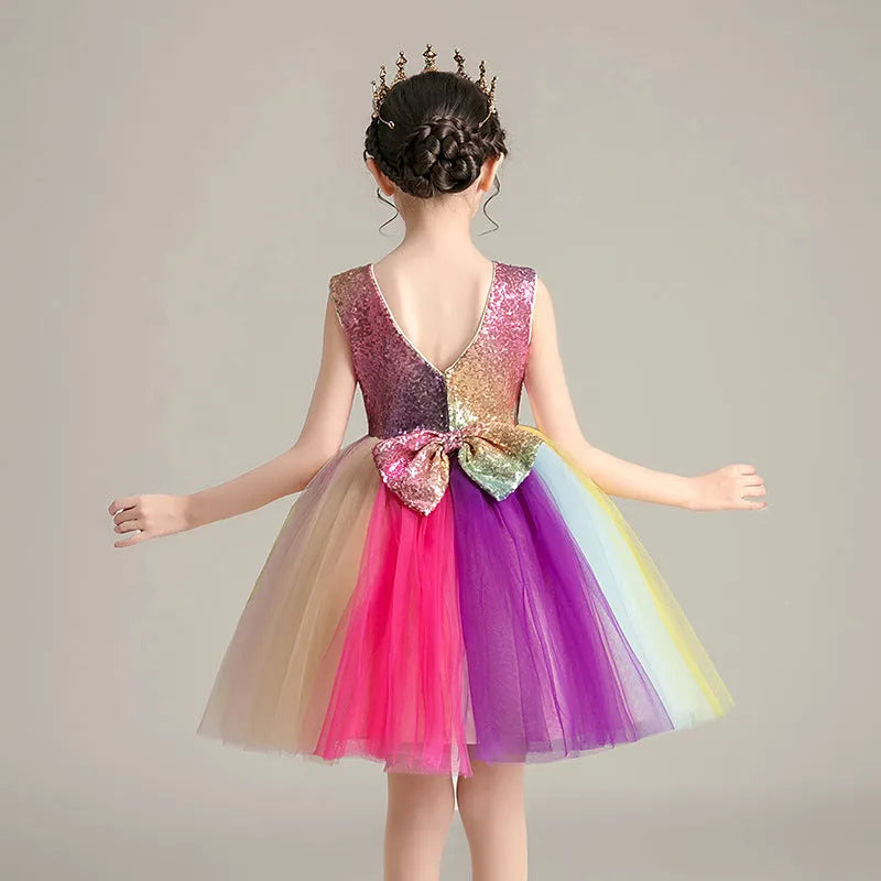 Girls cute rainbow skirt with lace and mesh layers, seven colours, 100% polyester outer, 80% cotton lining, available in sizes up to 160cm