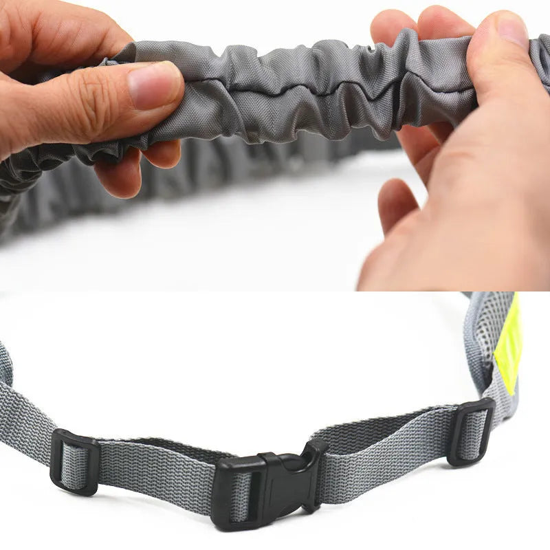 Adjustable hands free dog leash set with gray nylon retractable rope and waist bag on a grass field