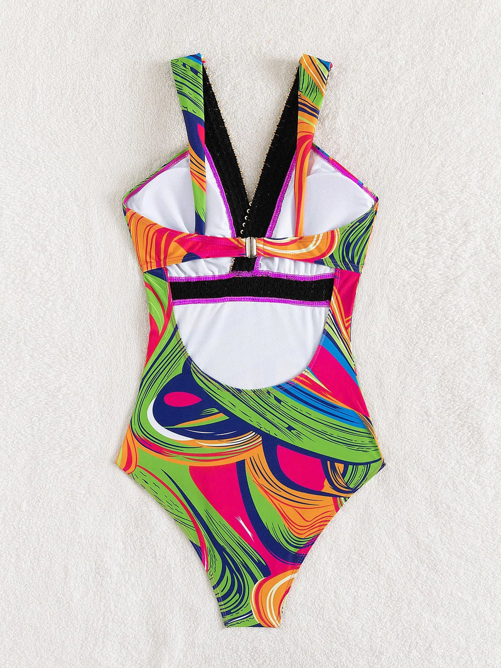 Women's deep V neck one-piece swimsuit with spaghetti straps on a hanger
