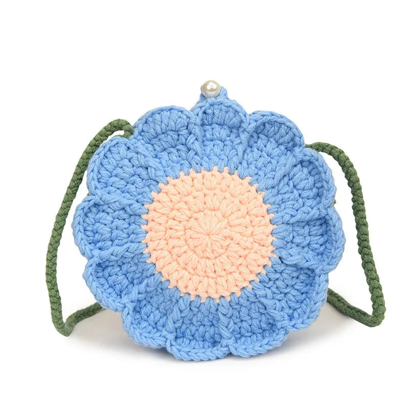 Hand-woven round bag with crocheted flowers, cotton lining, and internal phone pocket in four colour options
