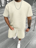 Men's grey short sleeve top and matching shorts suit set for casual leisure wear.