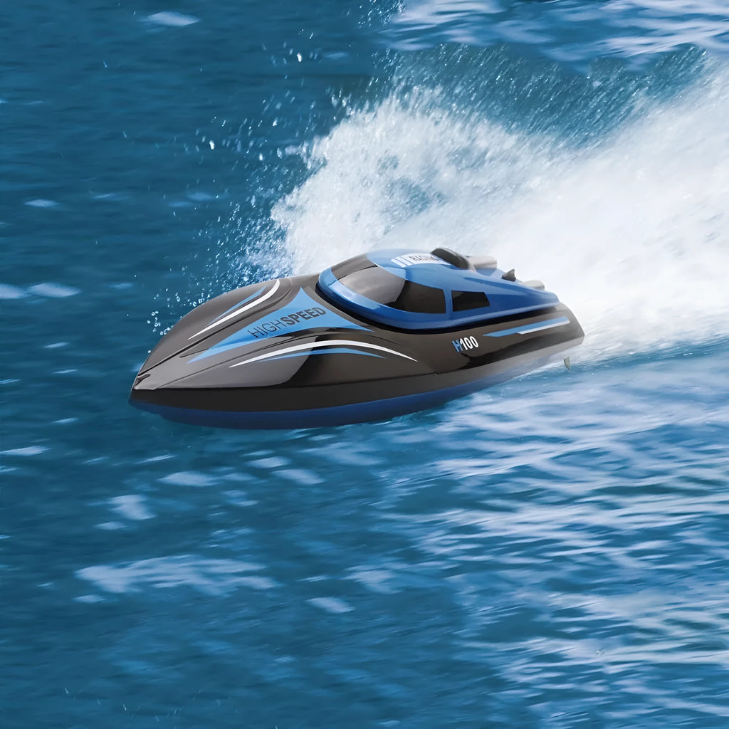 Blue speed racing RC boat on water, with remote control transmitter featuring LCD screen