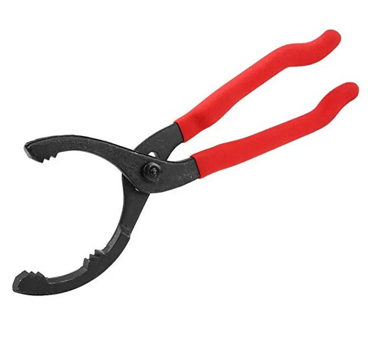Red 12 inch high carbon steel filter wrench for removing oil filters, laid on a workshop surface