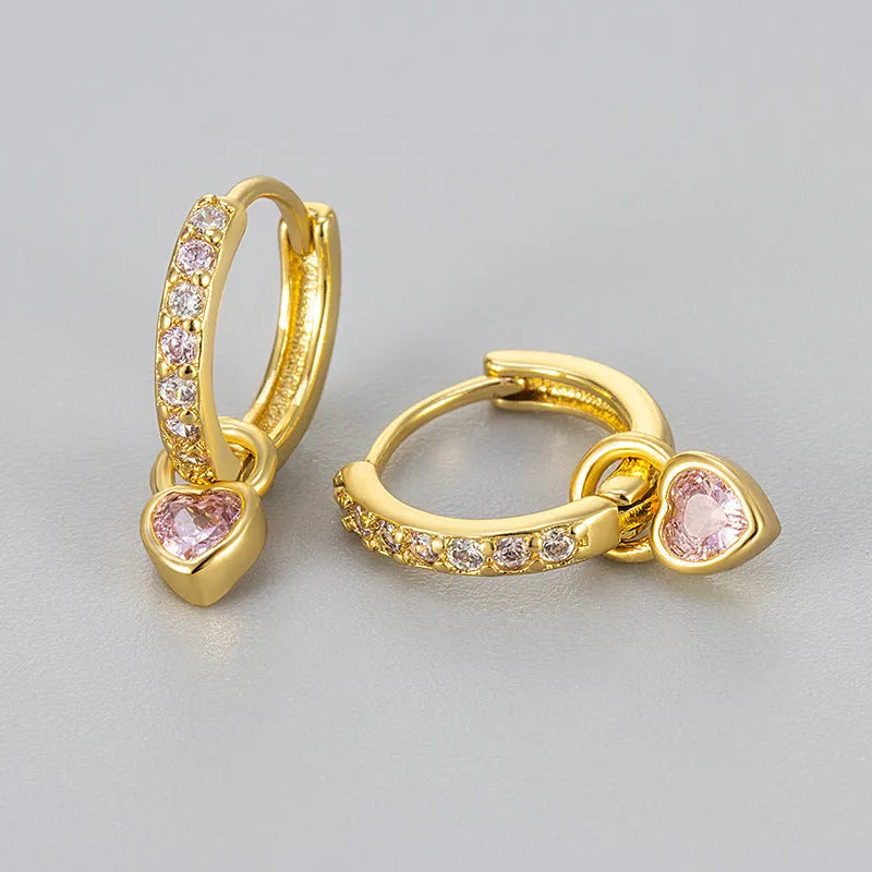 Women's zircon heart drop earrings with coloured stone in gold or white gold colour setting.