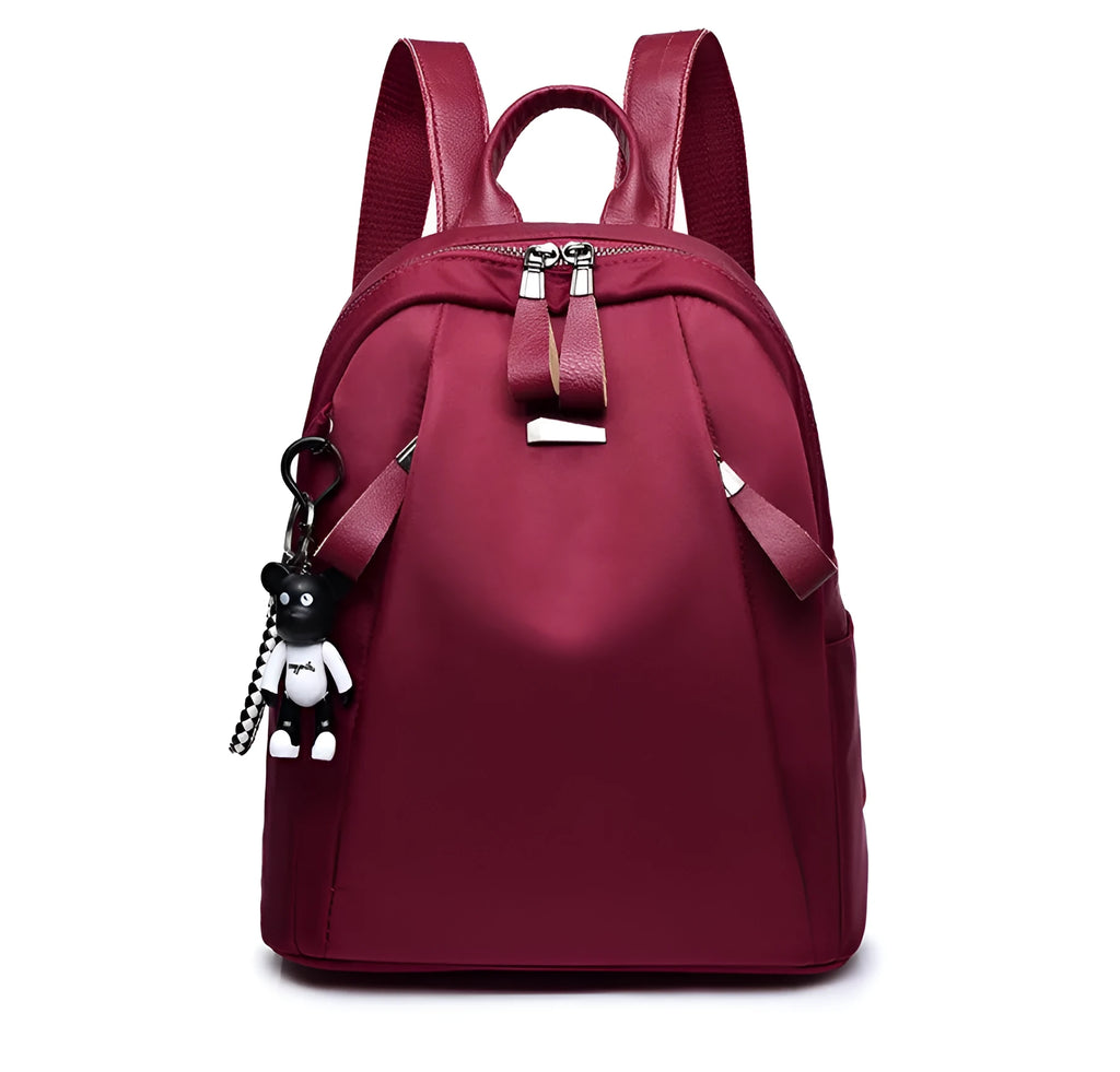Medium wine red Oxford cloth rucksack showing internal phone and ID compartments