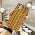 Wooden iPhone back cover case shown in rosewood, teak, black rose, and walnut colour options.