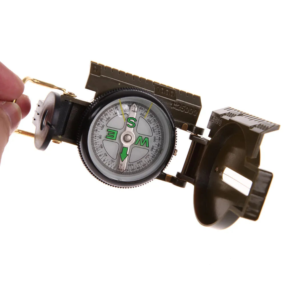 Army green aluminium alloy foldable compass with kerosene damping, opened to show lens and needle