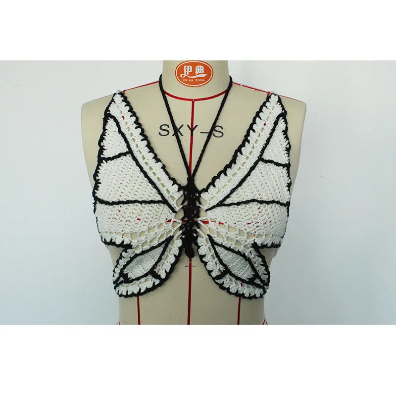 Women's black and white classic bikini swimsuit set on a mannequin.
