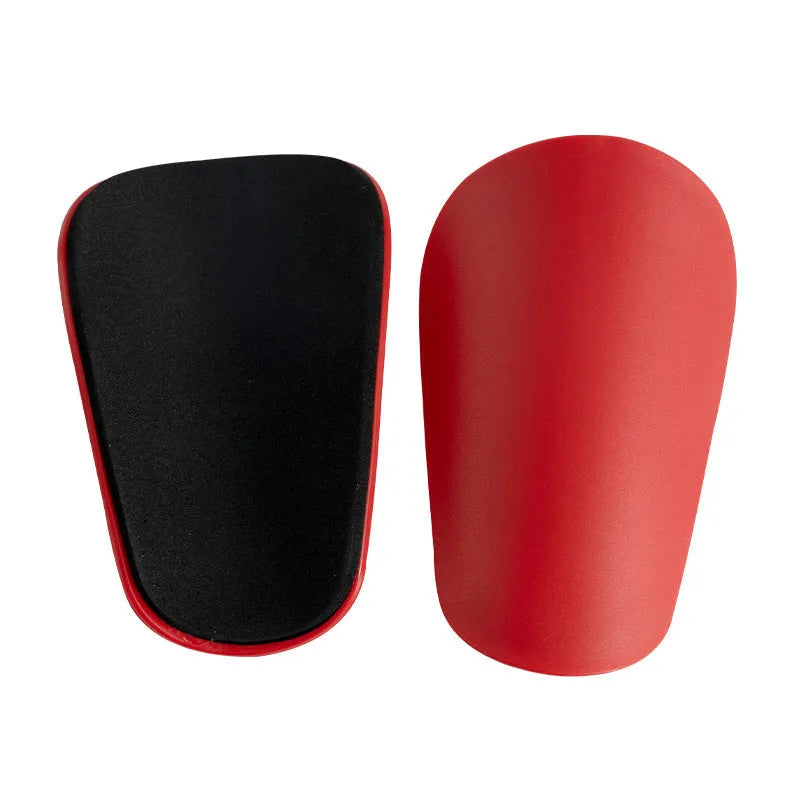 Pair of PU mini football shin guards for sports protection in various colours.
