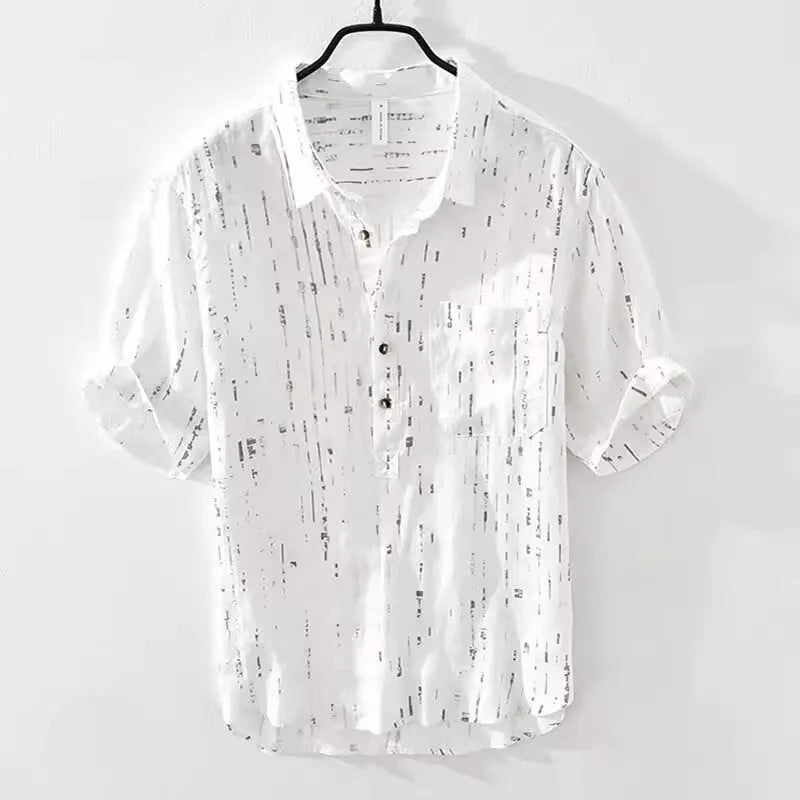 Man wearing a loose-fit black lapel polo shirt, a short-sleeved cardigan-style t-shirt for summer.