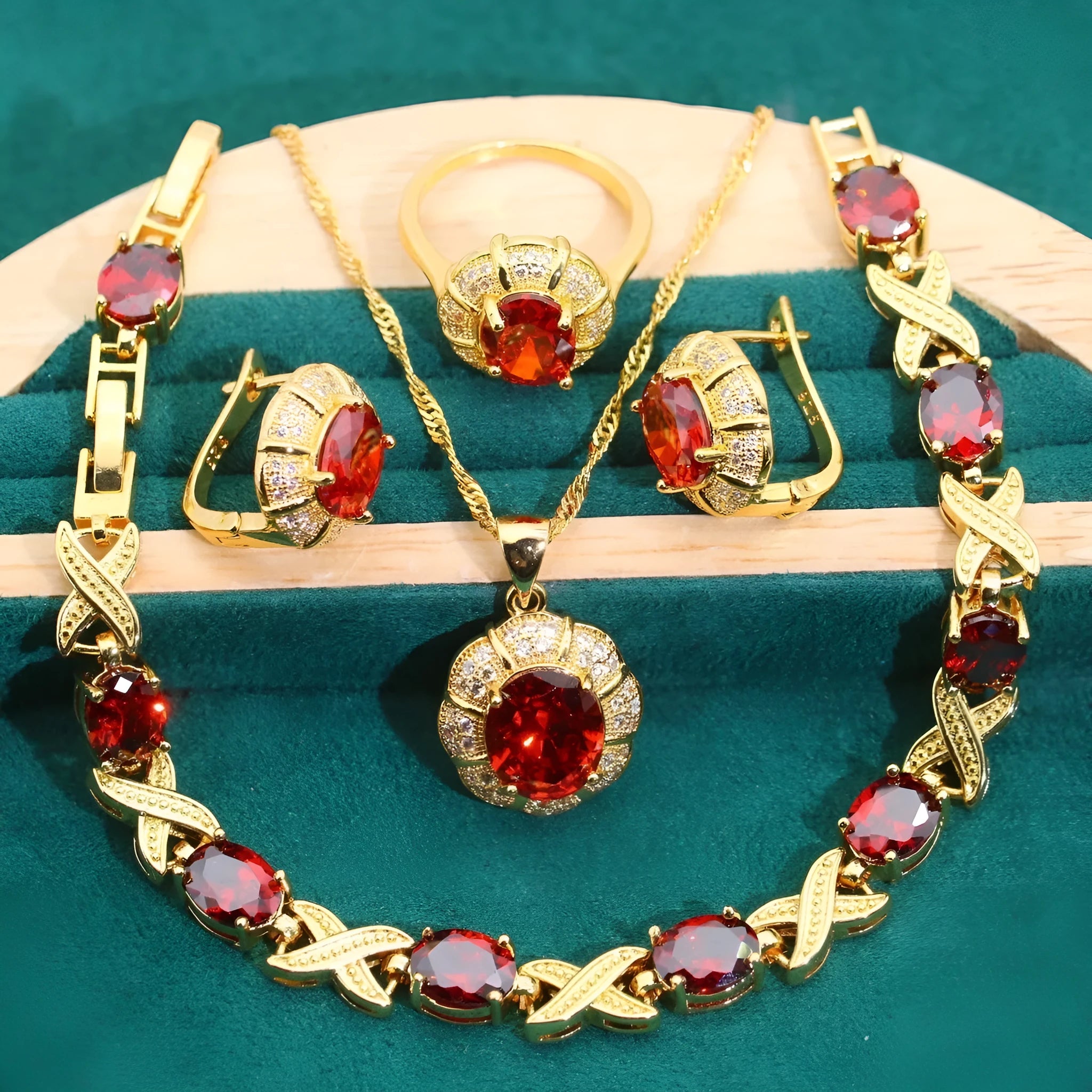 18k gold plated jewellery set with cubic zirconia stones showing necklace, earrings, ring, and bracelet