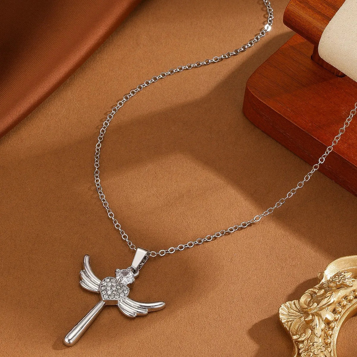 Silver heart-shaped angel wings pendant clavicle chain necklace for women, titanium steel and alloy, cross design, affordable luxury style