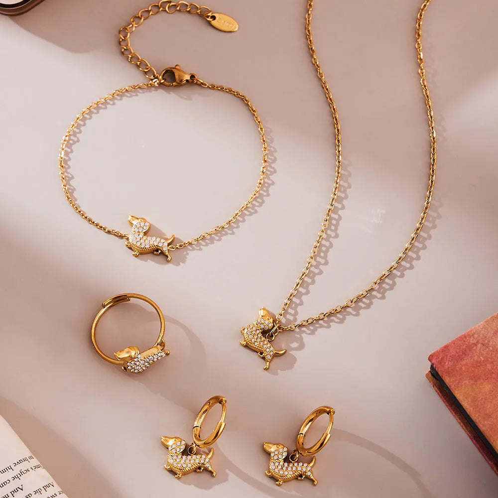 Gold puppy zircon bracelet with chain pattern and full zirconium accents on titanium steel