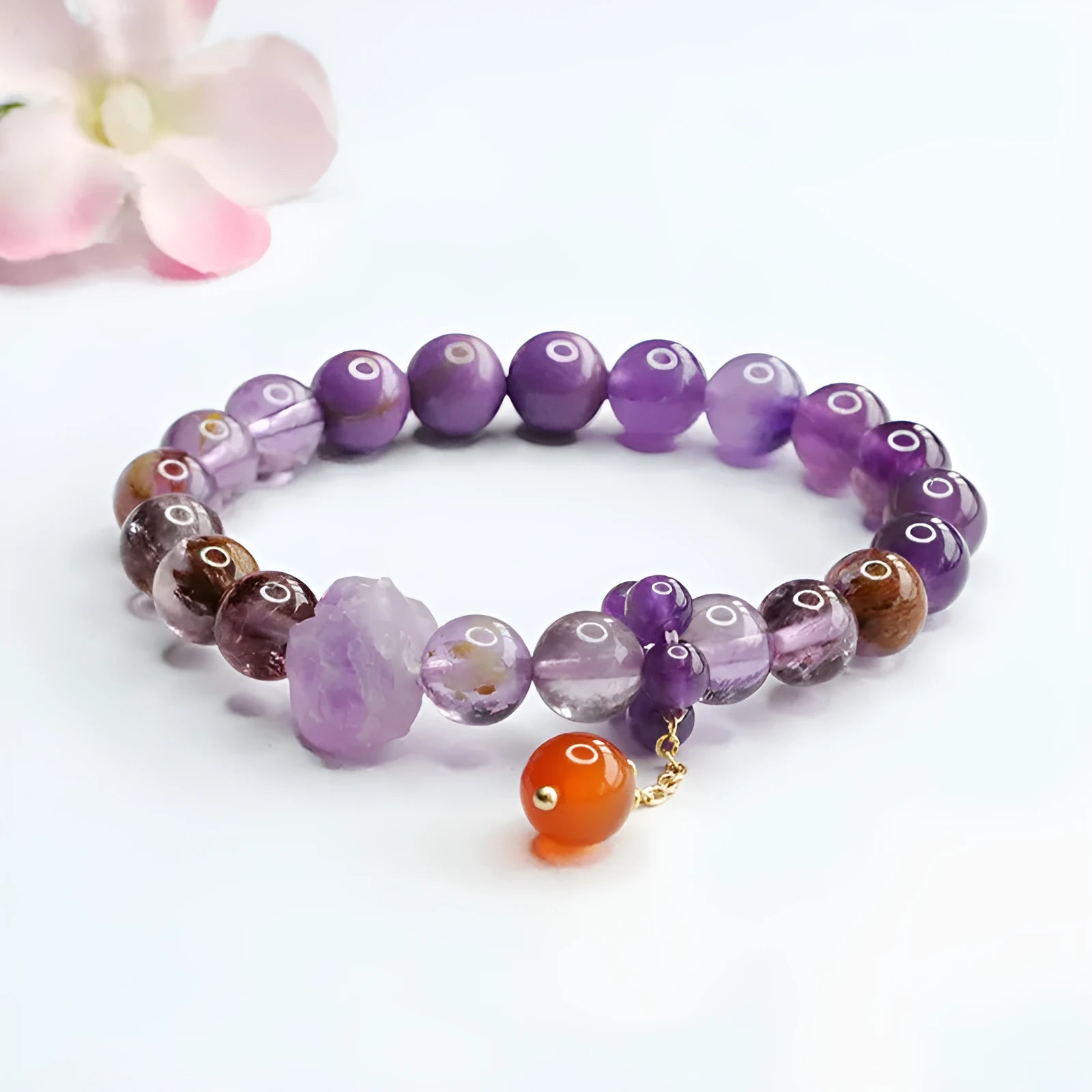 Natural nine purple fire Duobao crystal bracelet in Mori style with amethyst and red agate stones.