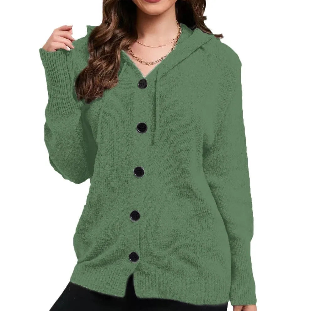Women's loose fit thick cotton hooded cardigan sweater in a solid colour on a hanger.