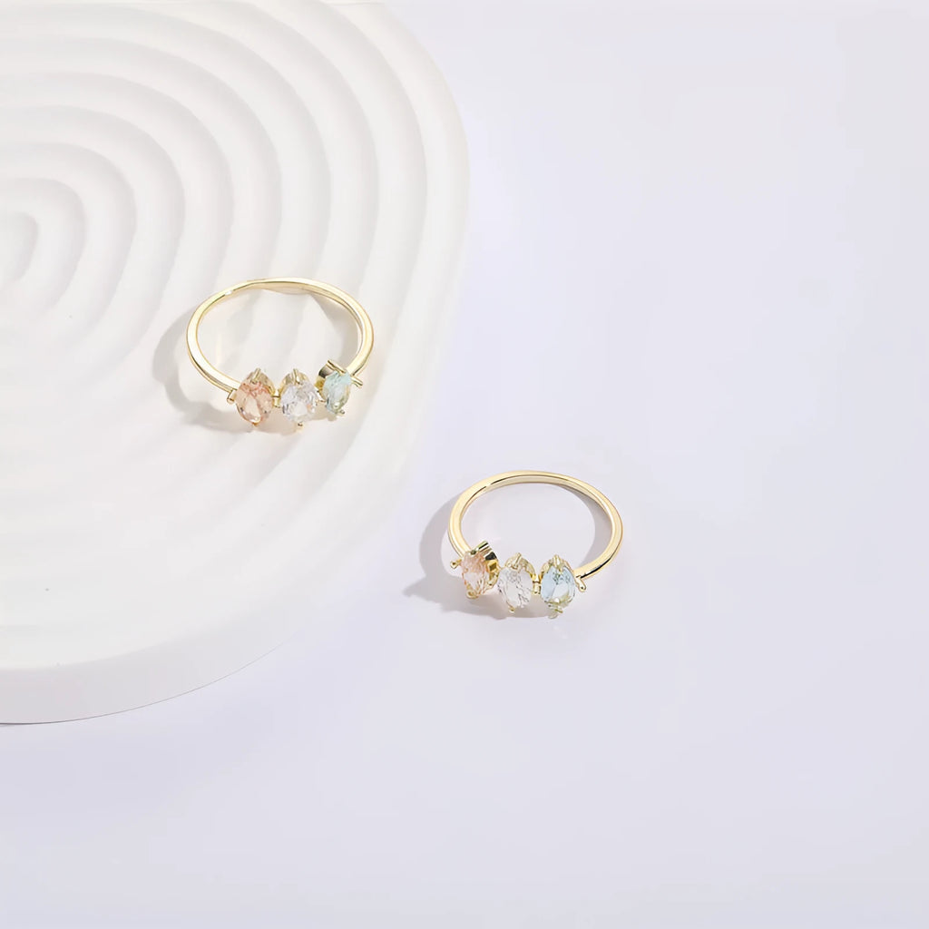 Mother's Day birthstone ring with geometric triangle design and horse eye tricolour zircon stones in 14k gold colour