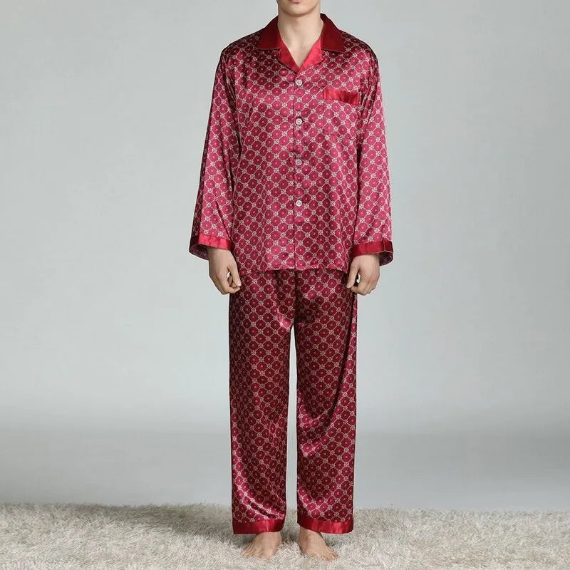 Men's red and blue printed imitation silk pajama suit with lapel collar, long sleeves, and trousers on a model