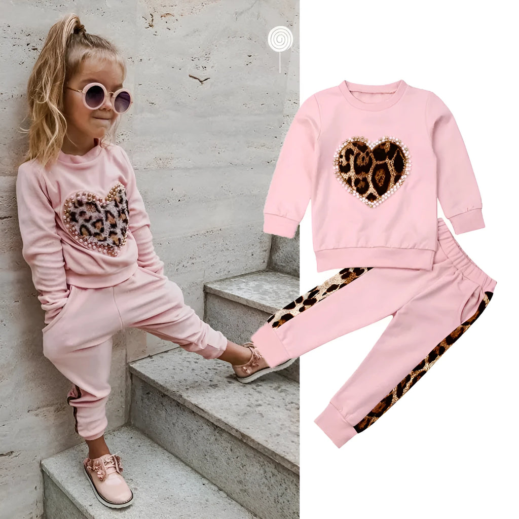 Children's pink cotton print sweatshirt and trousers two-piece set on white background