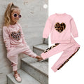 Children's pink cotton print sweatshirt and trousers two-piece set on white background