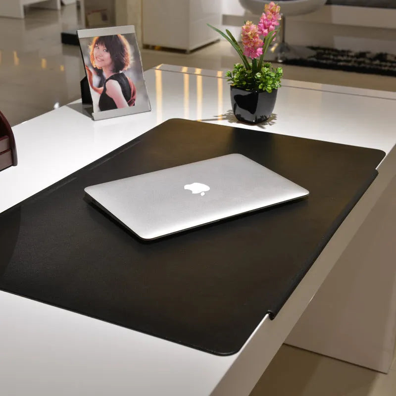 Large PVC desk mat in black, 700x450mm, non-slip surface for keyboard and mouse