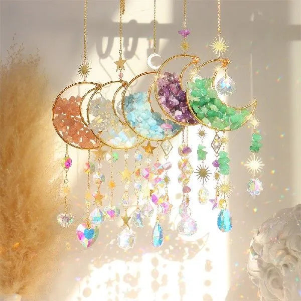 K9 crystal moon car pendant hanging on a metal chain, shown in a blue colour option.
