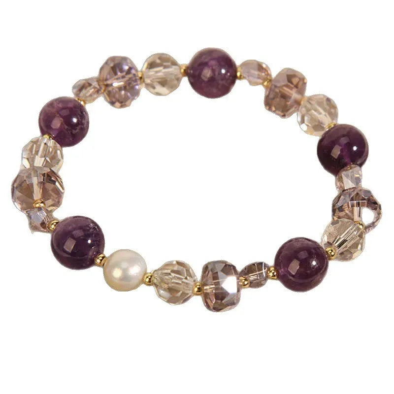 Women's artificial amethyst bracelet with four-leaf clover pendant and pearl accents on a U-shaped cuff.