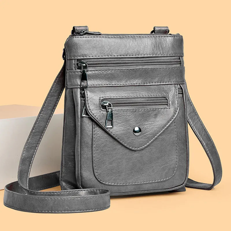 Vertical square crossbody mobile phone bag in PU leather with decorative sewing lines