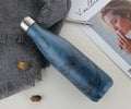 500ml stainless steel vacuum flask with double wall insulation and Coke bottle shape, shown as a thermal water bottle for hot and cold drinks.