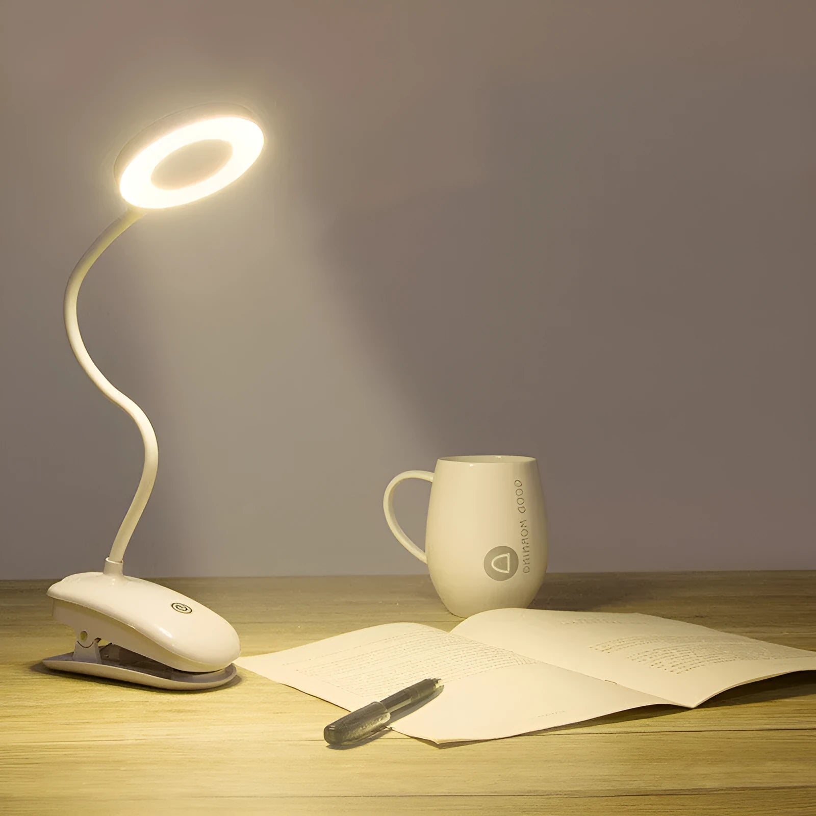 Clip-on rechargeable desk lamp with touch controls showing modern minimalist design