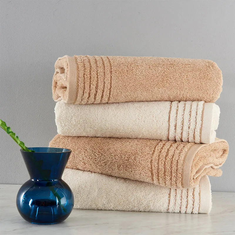 Six-piece cotton towel set showing bath, hand, and washcloth sizes in beige colour.