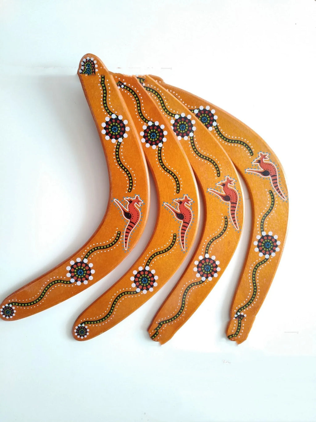 Wooden V-shaped revolving dart in black with flying back mechanism and anime kangaroo image