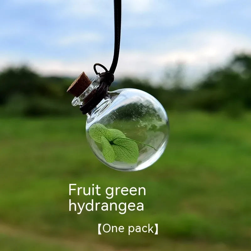 Glass car perfume pendant with preserved flowers for interior decoration and air freshening