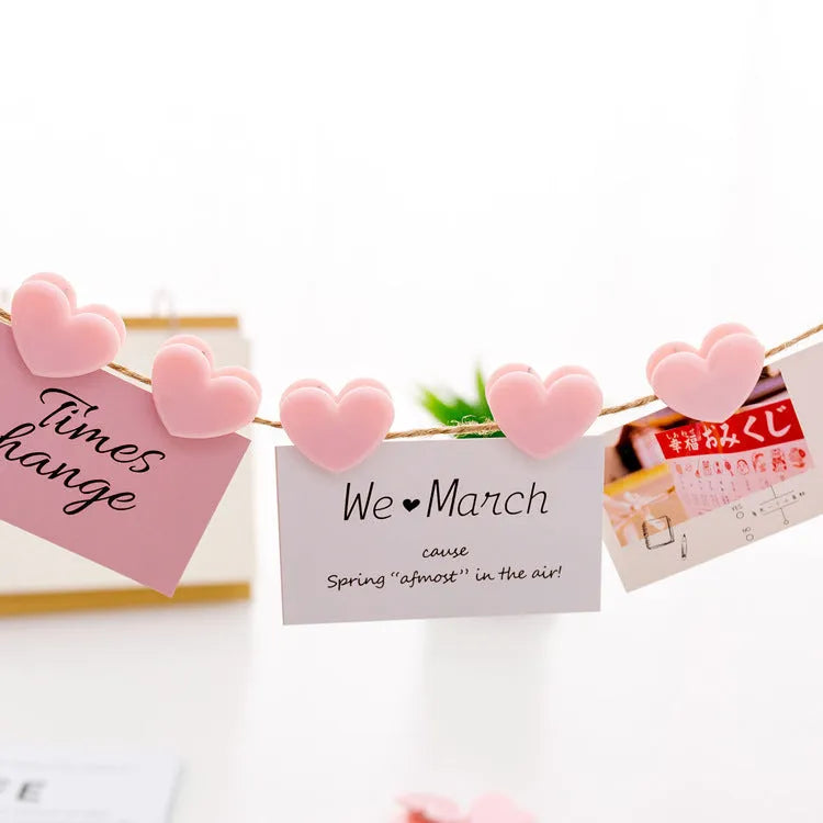 Pink heart-shaped love clip measuring 3.2 x 2.5cm for holding a photo or note