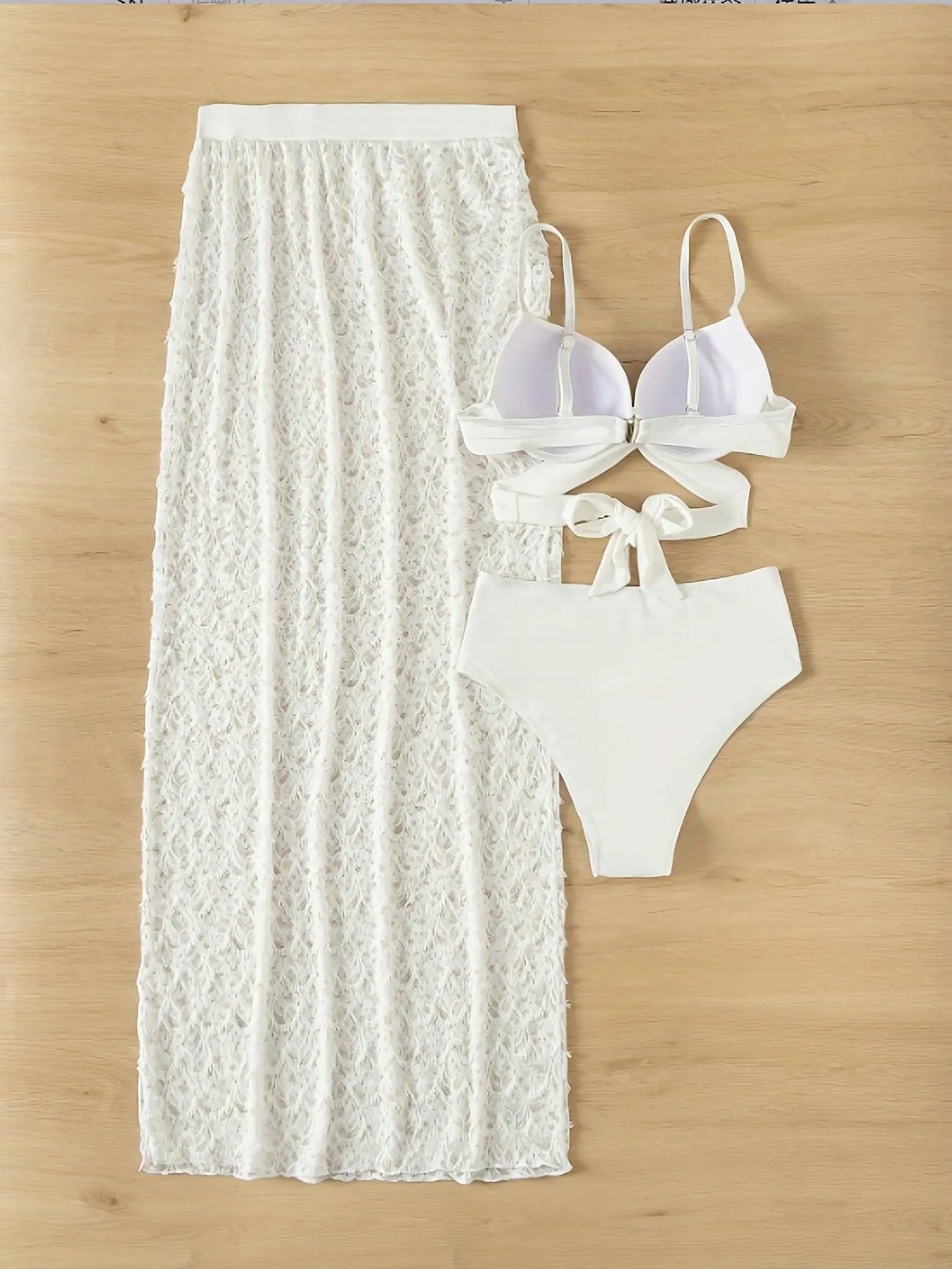 White nylon swimsuit set with gathered long skirt, top, and briefs for swimming sports