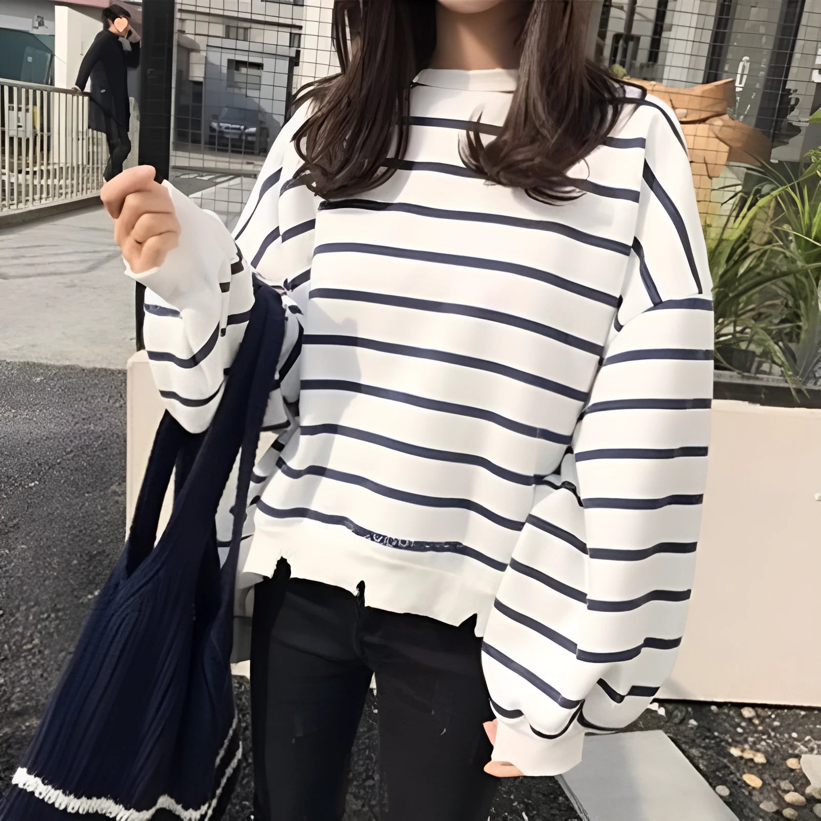 Women's loose fit long sleeve thermal striped T-shirt in white, front view, flight sleeve design