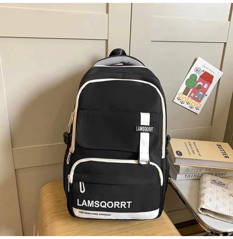 Waterproof nylon school backpack with curved shoulder straps in multiple colour options