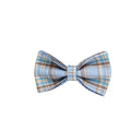 Sky blue grid forest pattern dog collar, leash, bow, and vest four-piece set on white background