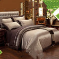 Cotton bedding set with floral plant pattern, satin weave, and embroidery quilting in blue and white colourway