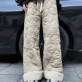 Winter cotton-padded waterproof patchwork lambskin cotton pants in black, side view