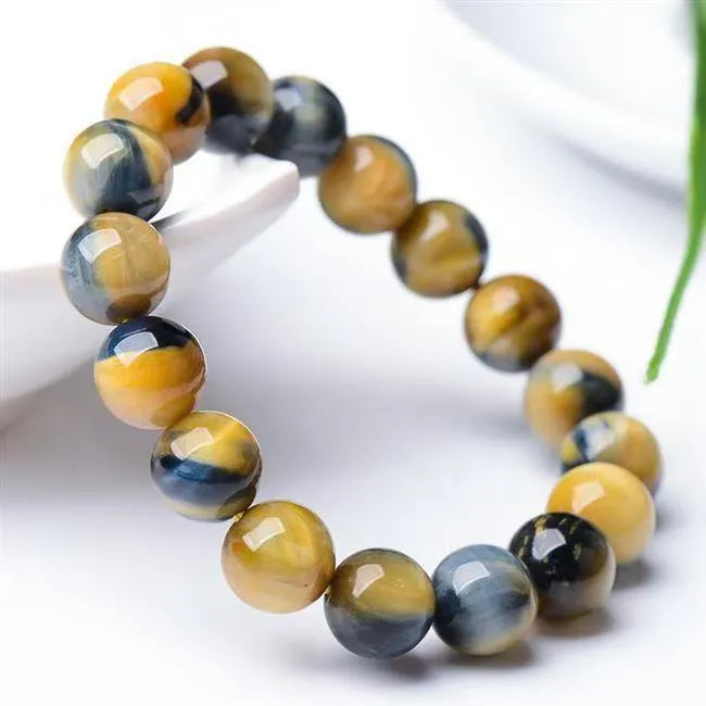 Handmade fantasy tiger eye agate bracelet with geometric round beads in natural stone patterns