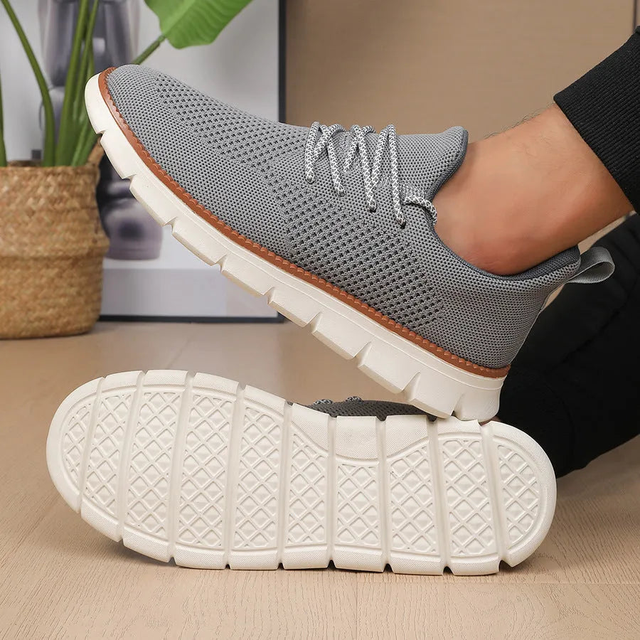 Men's grey mesh fabric casual sneakers with round toe and low heel design