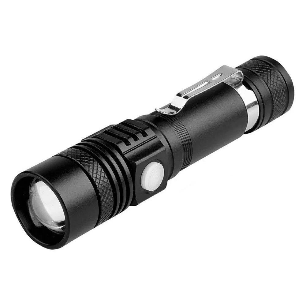 Black telescopic zoom USB rechargeable T6 LED flashlight on outdoor background