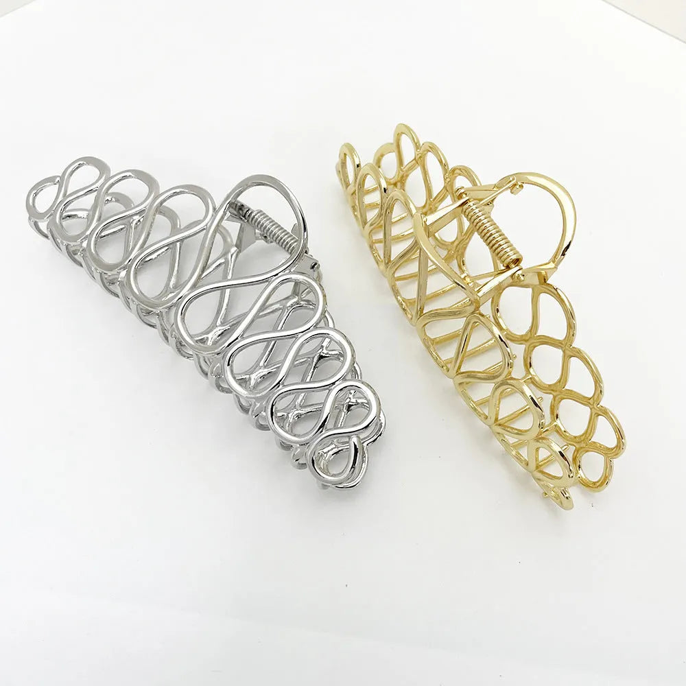Large minimalist hair clip with tassel decoration in gold or silver electroplated finish