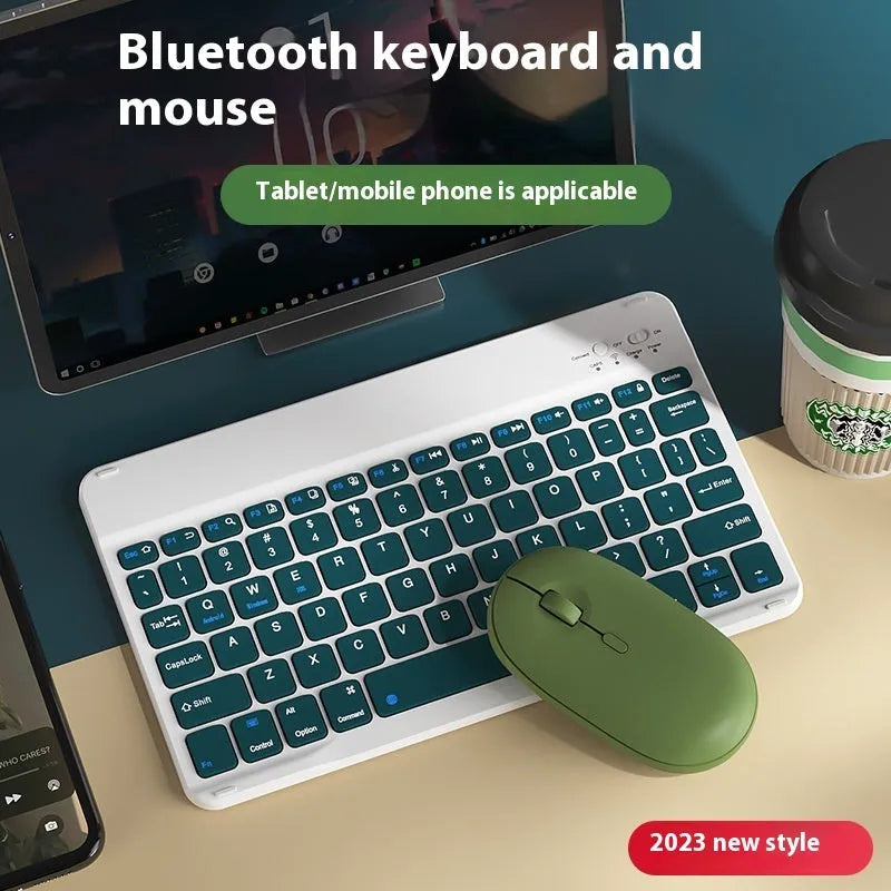 Bluetooth keyboard and matching rechargeable mouse set in elegant pink colour on a desk next to a tablet.