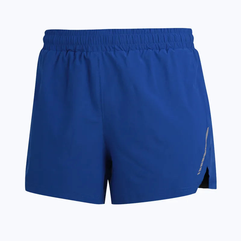 A man wearing grey quick-dry polyester running shorts for marathon training.