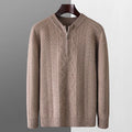 Men's grey diamond pattern half-zip wool sweater showing texture detail and zip neckline
