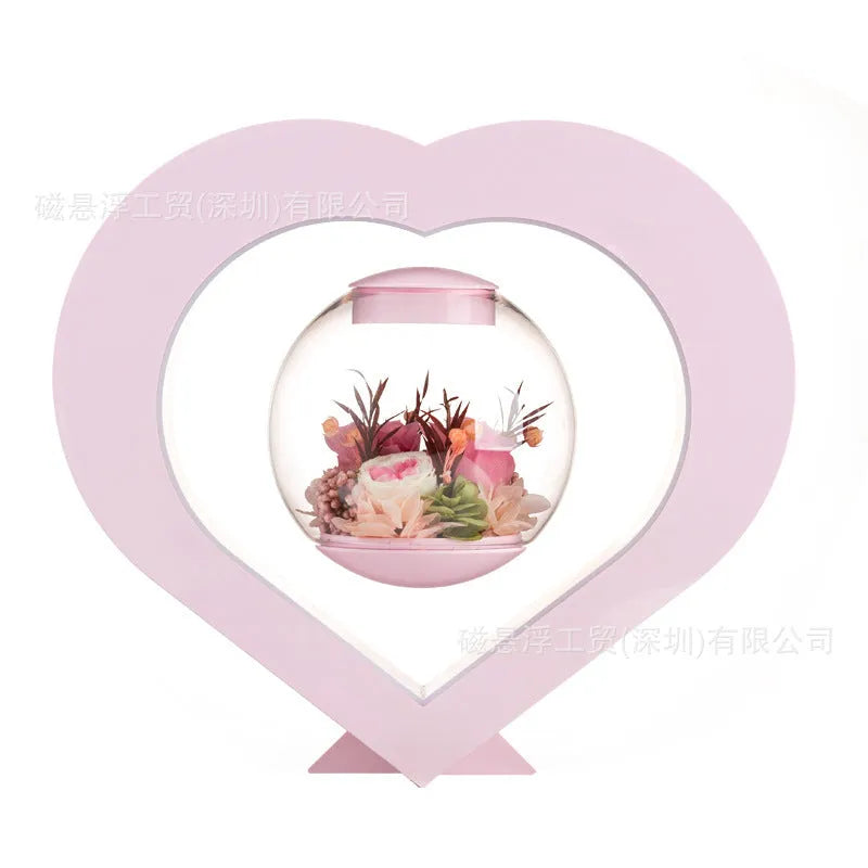 Pink preserved rose decorative ornament with optional base and Bluetooth audio functionality