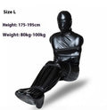 Black patent leather bondage garment with six ratchet tie-down straps for adult restraint